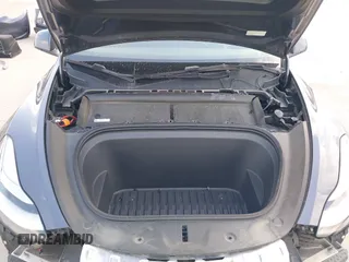 2023 Tesla Model Y Long Range with VIN 7SAYGDEEXPA078629, listed as a IAAI auction lot 42046354 with 27,245 mi miles and . Bid and sale history available at DreamBid. Image 10.