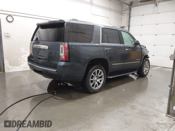2019 GMC Yukon Denali with VIN 1GKS2CKJ9KR359070, listed as a IAAI auction lot 41682027 with 95,015 mi miles. Bid and sale history available at carsss.com. Image 4.