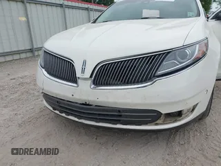 2013 Lincoln MKS with VIN 1LNHL9DKXDG604710, listed as a IAAI auction lot 42001875 with 117,724 mi miles and . Bid and sale history available at DreamBid. Image 6.
