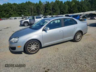 2008 Volkswagen Jetta Wolfsburg Edition with VIN 3VWRJ71K58M183091, listed as a Copart auction lot 64394595 with 185,150 mi miles and Salvage title. Bid and sale history available at DreamBid. Image 1.