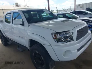 2006 Toyota Tacoma z VIN 3TMLU42N76M005039, wystawiony jako IAAI lot #42246524 z przebiegiem 50 459 mil mil oraz . Historia ofert i sprzedaży dostępna na DreamBid. Obrazek 1.