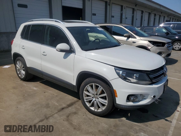 2015 Volkswagen Tiguan SEL with VIN WVGAV7AX3FW514081, listed as a Copart auction lot 59206245 with 121,166 mi miles and Salvage title. Bid and sale history available at DreamBid. Image 4.