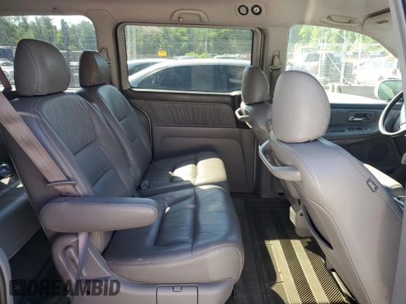 2003 Honda Odyssey EX-L z VIN 5FNRL18903B007639, wystawiony jako Copart lot #57230975 z przebiegiem 189 235 mil mil oraz Szkoda całkowita • Salvage title. Historia ofert i sprzedaży dostępna na DreamBid. Obrazek 11.