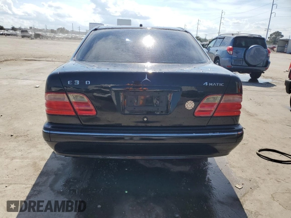 2001 Mercedes-Benz E-Class AWD with VIN WDBJF82J21X056553, listed as a Copart auction lot 73046694 with 0 mi miles and Salvage Title. Bid and sale history available at carsss.com. Image 6.