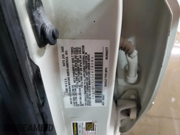 2005 Mitsubishi Endeavor Limited z VIN 4A4MN41SX5E070604, wystawiony jako Copart lot #75447324 z przebiegiem 235 974 mil mil oraz Szkoda całkowita • Salvage title. Historia ofert i sprzedaży dostępna na DreamBid. Obrazek 13.