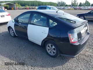 2005 Toyota Prius z VIN JTDKB20U450126080, wystawiony jako IAAI lot #42215698 z przebiegiem Nie podano mil oraz . Historia ofert i sprzedaży dostępna na DreamBid. Obrazek 3.