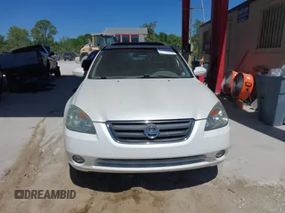 2002 Nissan Altima SE with VIN 1N4BL11D92C218274, listed as a IAAI auction lot 41788444 with 196,432 mi miles. Bid and sale history available at carsss.com. Image 6.