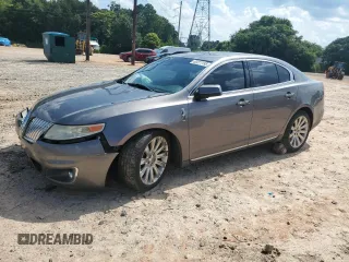 2012 Lincoln MKS с VIN 1LNHL9DR6CG801580, выставлен на аукционе Copart как лот 63311195 с пробегом 197 066 миль миль и Списание • Salvage title. История ставок и продаж доступна на DreamBid. Изображение 1.