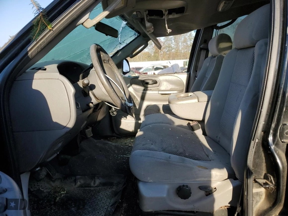 2003 Ford F-150 XLT with VIN 1FTRW08623KD45425, listed as a Copart auction lot 77605404 with 174,369 mi miles and Salvage Title. Bid and sale history available at carsss.com. Image 7.