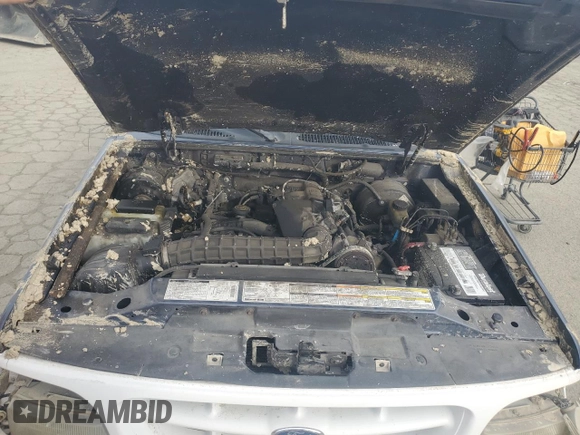 2000 Ford Explorer XLS z VIN 1FMZU62X3YZC03282, wystawiony jako Copart lot #45775715 z przebiegiem 187 709 mil mil oraz Szkoda całkowita • Salvage title. Historia ofert i sprzedaży dostępna na DreamBid. Obrazek 11.