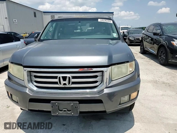 2012 Honda Ridgeline RTL z VIN 5FPYK1F54CB451175, wystawiony jako Copart lot #59536285 z przebiegiem 160 476 mil mil oraz Szkoda całkowita • Salvage title. Historia ofert i sprzedaży dostępna na DreamBid. Obrazek 13.