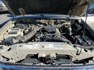 1999 Mazda B-Series Truck SX z VIN 4F4YR12C1XTM39102, wystawiony jako Copart lot #83462634 z przebiegiem 241 380 mil mil oraz Szkoda całkowita • Salvage title. Historia ofert i sprzedaży dostępna na DreamBid. Obrazek 11.