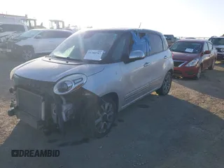 2015 FIAT 500L Lounge with VIN ZFBCFACH8FZ031149, listed as a IAAI auction lot 41780747 with 131,054 mi miles. Bid and sale history available at carsss.com. Image 2.