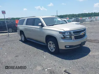 2015 Chevrolet Suburban LT with VIN 1GNSKJKC4FR587153, listed as a IAAI auction lot 42531807 with 148,564 mi miles and . Bid and sale history available at DreamBid. Image 1.