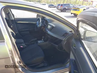 2015 Mitsubishi Lancer SE with VIN JA32V2FWXFU023626, listed as a IAAI auction lot 42012381 with 143,981 mi miles. Bid and sale history available at carsss.com. Image 5.