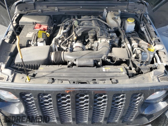 2023 Jeep Gladiator Sport z VIN 1C6HJTAG3PL530833, wystawiony jako Copart lot #56236565 z przebiegiem 15 967 mil mil oraz Szkoda całkowita • Salvage title. Historia ofert i sprzedaży dostępna na DreamBid. Obrazek 11.