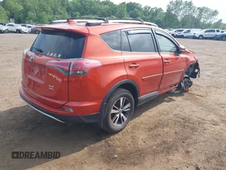 2016 Toyota RAV4 XLE z VIN JTMRFREV6GJ101367, wystawiony jako IAAI lot #42434491 z przebiegiem 79 411 mil mil oraz . Historia ofert i sprzedaży dostępna na DreamBid. Obrazek 4.