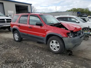 2002 Ford Escape XLT Choice with VIN 1FMCU04132KB16848, listed as a Copart auction lot 55266595 with 205,451 mi miles and Salvage title. Bid and sale history available at DreamBid. Image 4.