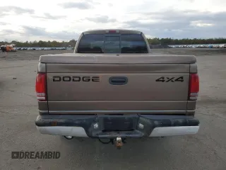 2001 Dodge Dakota z VIN 1B7GG2AX11S108005, wystawiony jako Copart lot #87124934 z przebiegiem 248 482 mil mil oraz Czysty tytuł • Clean title. Historia ofert i sprzedaży dostępna na DreamBid. Obrazek 6.
