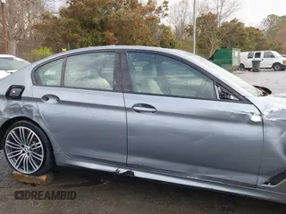 2018 BMW 5 Series 540i xDrive with VIN WBAJE7C52JWC57407, listed as a IAAI auction lot 41805890 with 112,151 mi miles and . Bid and sale history available at DreamBid. Image 13.