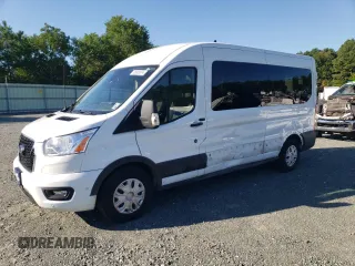 2021 Ford Transit Passenger XL with VIN 1FBAX2C84MKA04547, listed as a Copart auction lot 72682074 with 87,077 mi miles and Salvage Title. Bid and sale history available at DreamBid. Image 1.
