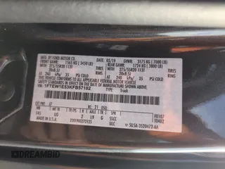 2019 Ford F-150 XL with VIN 1FTEW1E53KFB57102, listed as a Copart auction lot 61633055 with 86,949 mi miles and Salvage title. Bid and sale history available at DreamBid. Image 12.