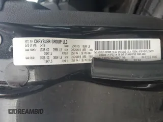 2010 Jeep Commander Limited with VIN 1J4RG5GT4AC146847, listed as a Copart auction lot 50259965 with 114,894 mi miles and Salvage title. Bid and sale history available at DreamBid. Image 13.