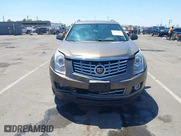 2015 Cadillac SRX Performance Collection with VIN 3GYFNFE35FS569682, listed as a IAAI auction lot 42322229 with 124,365 mi miles and . Bid and sale history available at DreamBid. Image 6.