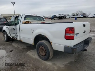 2005 Ford F-150 XL with VIN 1FTRF12W65NB56941, listed as a Copart auction lot 52200065 with 164,464 mi miles and Salvage title. Bid and sale history available at DreamBid. Image 2.