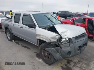 2003 Nissan Frontier XE with VIN 1N6ED27T03C437454, listed as a IAAI auction lot 41490829 with 176,622 mi miles and . Bid and sale history available at DreamBid. Image 1.