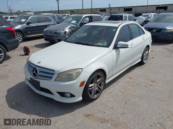 2010 Mercedes-Benz C-Class C 300 Sport with VIN WDDGF5EB1AR086684, listed as a IAAI auction lot 42064398 with 206,659 mi miles. Bid and sale history available at carsss.com. Image 2.