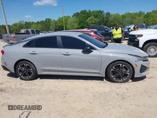 2022 Kia K5 GT-Line z VIN 5XXG64J23NG156401, wystawiony jako IAAI lot #42051123 z przebiegiem 71 853 mil mil oraz . Historia ofert i sprzedaży dostępna na DreamBid. Obrazek 13.