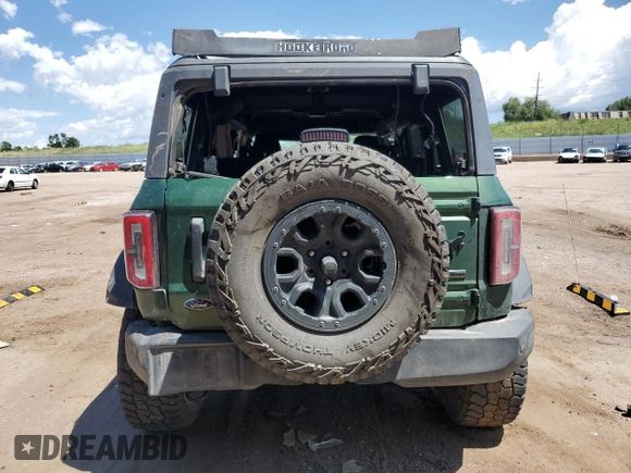 2022 Ford Bronco с VIN 1FMEE5DP0NLA72491, выставлен на аукционе Copart как лот 62482815 с пробегом 80 184 миль миль и Списание • Salvage title. История ставок и продаж доступна на DreamBid. Изображение 6.