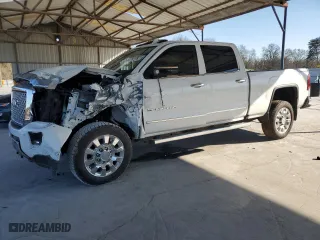 2017 GMC Sierra 2500HD Denali with VIN 1GT12UEY6HF249951, listed as a Copart auction lot 41397235 with 99,713 mi miles and Salvage Title. Bid and sale history available at carsss.com. Image 1.