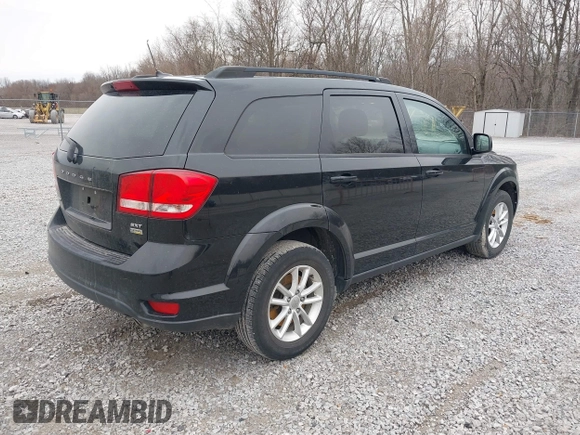 2014 Dodge Journey SXT with VIN 3C4PDCBG1ET142687, listed as a IAAI auction lot 41698232 with 170,521 mi miles. Bid and sale history available at carsss.com. Image 4.