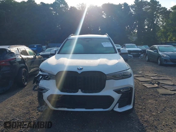 2019 BMW X7 xDrive50i z VIN 5UXCX4C53KLB40280, wystawiony jako IAAI lot #39936228 z przebiegiem Nie podano mil oraz . Historia ofert i sprzedaży dostępna na DreamBid. Obrazek 6.