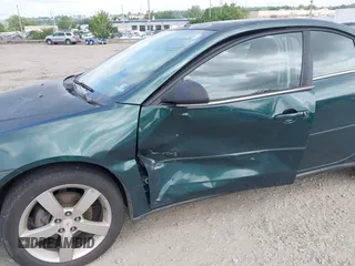 2007 Pontiac G6 GTP with VIN 1G2ZM587774240955, listed as a IAAI auction lot 42706173 with 56,291 mi miles and . Bid and sale history available at DreamBid. Image 6.