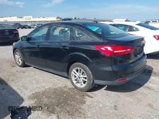 2017 Ford Focus SE with VIN 1FADP3F24HL217719, listed as a IAAI auction lot 42560745 with 93,595 mi miles and . Bid and sale history available at DreamBid. Image 3.