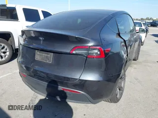 2025 Tesla Model Y Long Range with VIN 7SAYGDED2SF228414, listed as a IAAI auction lot 41706470 with 11,319 mi miles and . Bid and sale history available at DreamBid. Image 4.