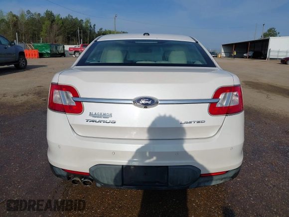2012 Ford Taurus Limited z VIN 1FAHP2FW1CG103595, wystawiony jako IAAI lot #41913906 z przebiegiem 308 496 mil mil oraz . Historia ofert i sprzedaży dostępna na DreamBid. Obrazek 16.
