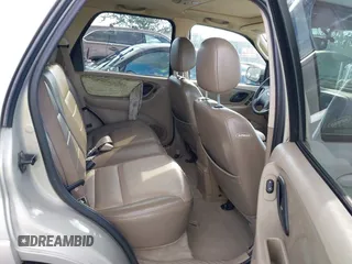 2004 Ford Escape Limited z VIN 1FMCU04104KA41934, wystawiony jako IAAI lot #41444706 z przebiegiem 169 347 mil mil oraz . Historia ofert i sprzedaży dostępna na DreamBid. Obrazek 8.