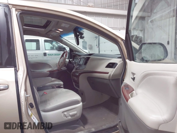 2014 Toyota Sienna Ltd with VIN 5TDDK3DCXES074614, listed as a IAAI auction lot 41691123 with 117,571 mi miles. Bid and sale history available at carsss.com. Image 5.