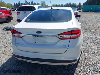2018 Ford Fusion Hybrid SE with VIN 3FA6P0LU3JR226934, listed as a IAAI auction lot 42063065 with 126,683 mi miles. Bid and sale history available at carsss.com. Image 16.