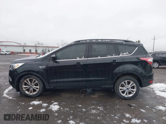 2017 Ford Escape SE with VIN 1FMCU0GD5HUD08968, listed as a IAAI auction lot 42008576 with 95,363 mi miles and . Bid and sale history available at DreamBid. Image 14.