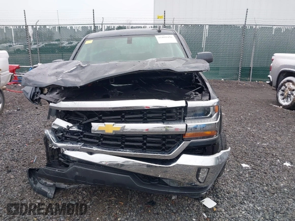 2018 Chevrolet Silverado 1500 LT with VIN 2GCVKREC6J1102304, listed as a IAAI auction lot 41800456 with 82,000 mi miles and . Bid and sale history available at DreamBid. Image 12.