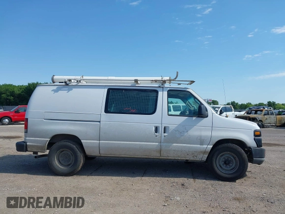 2014 Ford Econoline Cargo Commercial with VIN 1FTNE1EW4EDB20183, listed as a IAAI auction lot 42231075 with 260,818 mi miles and . Bid and sale history available at DreamBid. Image 13.