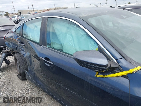 2020 Honda Civic LX z VIN 19XFC2F69LE203697, wystawiony jako IAAI lot #41608520 z przebiegiem 46 735 mil mil oraz . Historia ofert i sprzedaży dostępna na DreamBid. Obrazek 13.