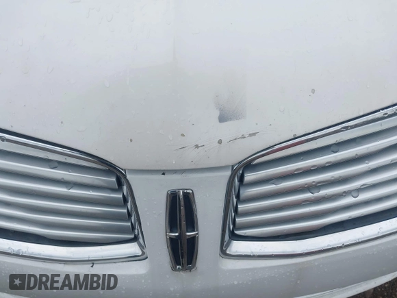 2016 Lincoln MKZ with VIN 3LN6L2JK9GR609137, listed as a IAAI auction lot 42679691 with 125,180 mi miles and . Bid and sale history available at DreamBid. Image 6.