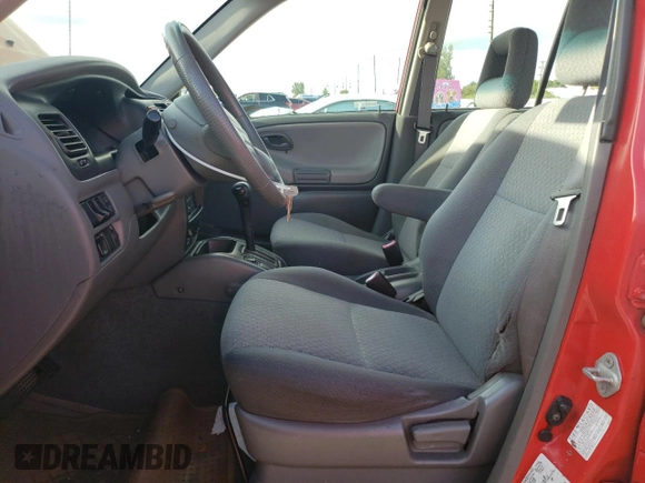 2003 Chevrolet Tracker with VIN 2CNBE13CX36943395, listed as a Copart auction lot 70964574 with 118,975 mi miles and Salvage title. Bid and sale history available at DreamBid. Image 7.