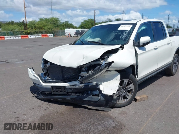 2019 Honda Ridgeline RTL with VIN 5FPYK2F52KB004624, listed as a IAAI auction lot 41789190 with 51,834 mi miles and . Bid and sale history available at DreamBid. Image 6.